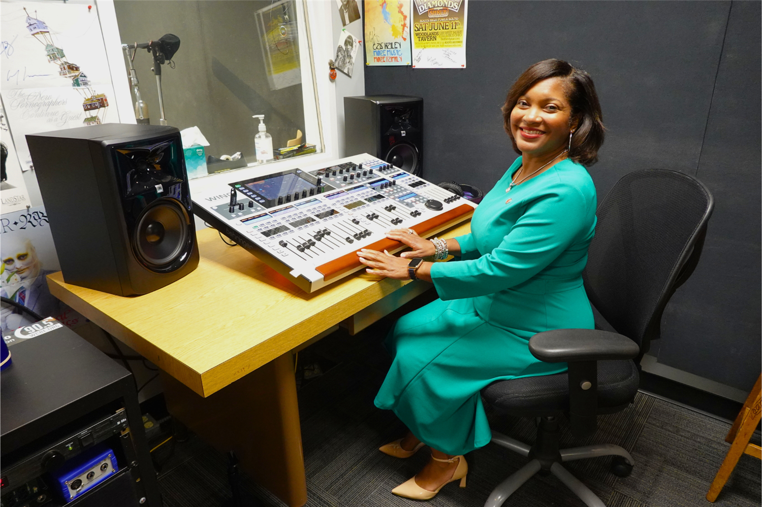 dr chapman sitting at a sound board